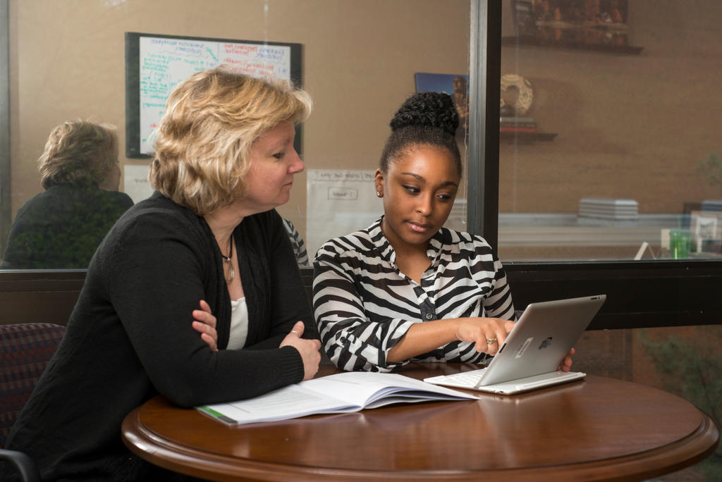 Student working with a school advisor